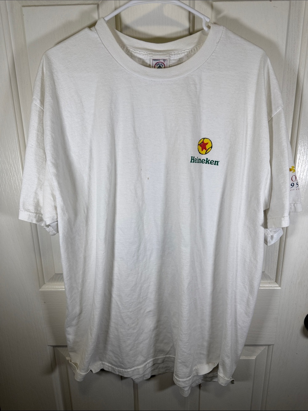 Delta Heineken White US Open Art by McEnroe 2 Short Sleeve Logo Tee